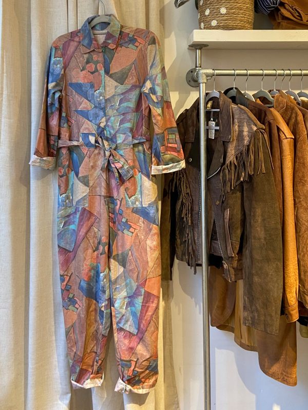late 1980s geometric jumpsuit front view with belt