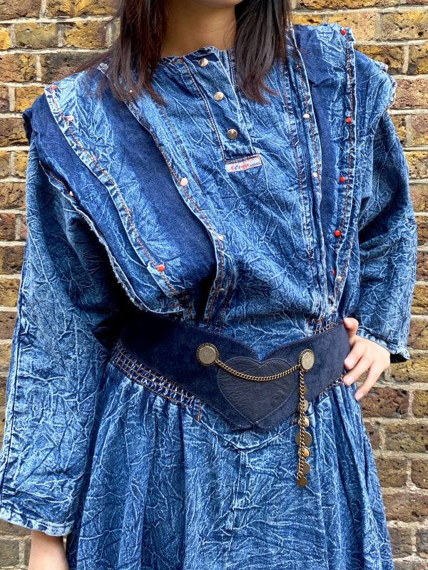 detail of crinkled denim fabric on 1980s dress