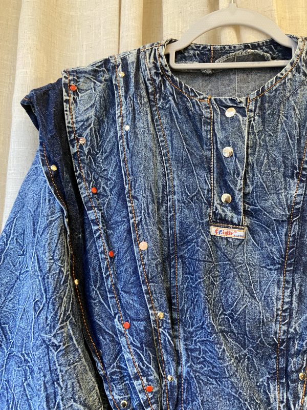 detail of crinkled denim fabric on 1980s dress
