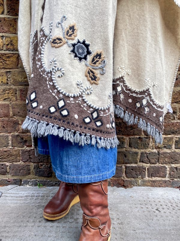 Late 1990s embroidered poncho with colourful floral embroidery and boho fringe hem