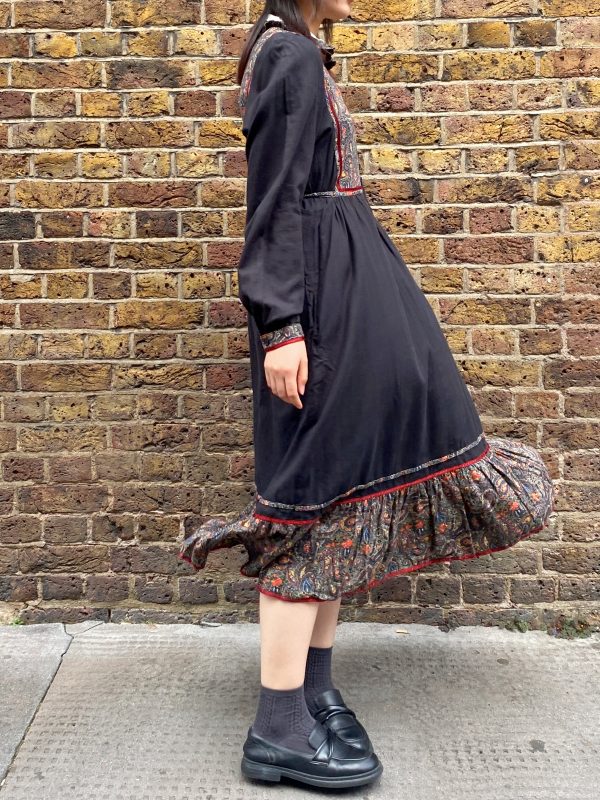 model wearing late 1970s prairie dress with puffed sleeves