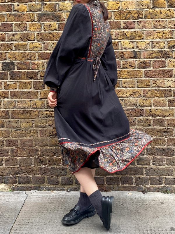 model wearing late 1970s prairie dress with puffed sleeves