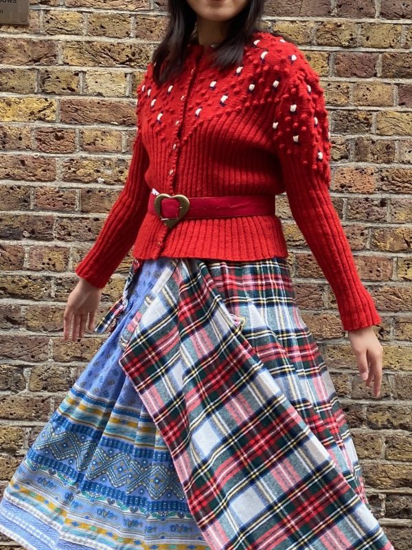 Vintage 1940s red bobble knit cardigan styled with relaxed fit on model, UK size 8