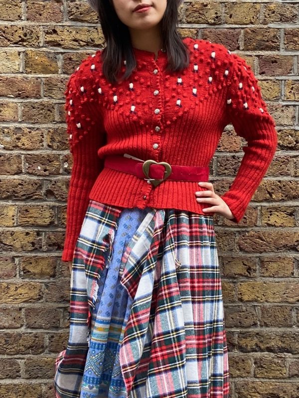 Vintage 1940s red bobble knit cardigan styled with relaxed fit on model, UK size 8