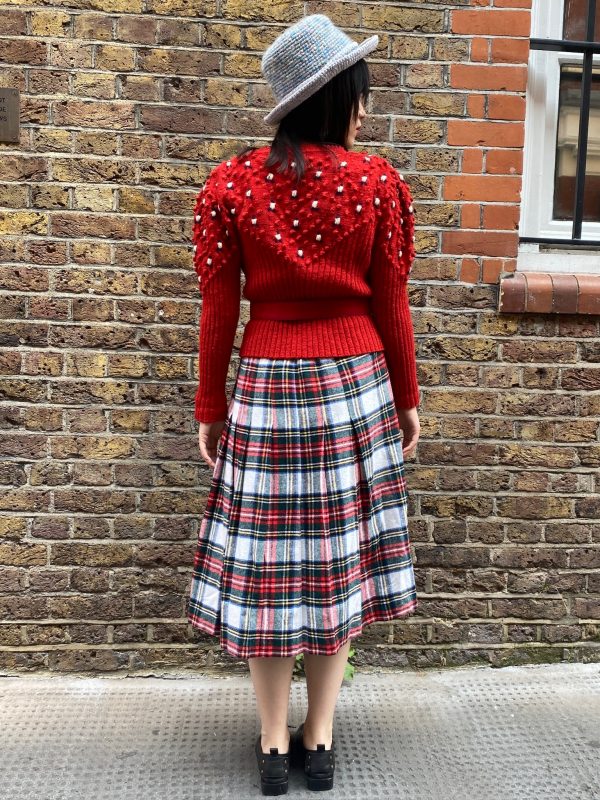 Vintage 1940s red bobble knit cardigan styled with relaxed fit on model, UK size 8