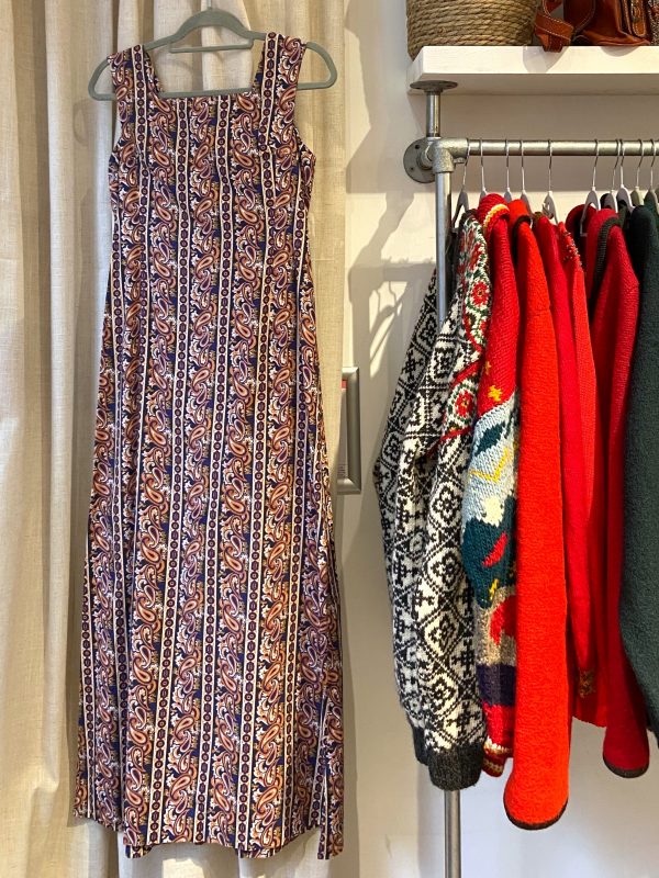 Full-length view of late 1960s paisley maxi dress with bohemian stripe print
