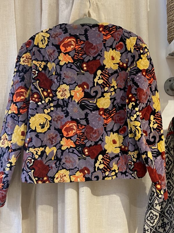 Back view of 1980s vintage floral quilted jacket with velvet texture