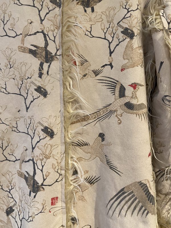 Just Cavalli designer coat blossom print fabric close-up