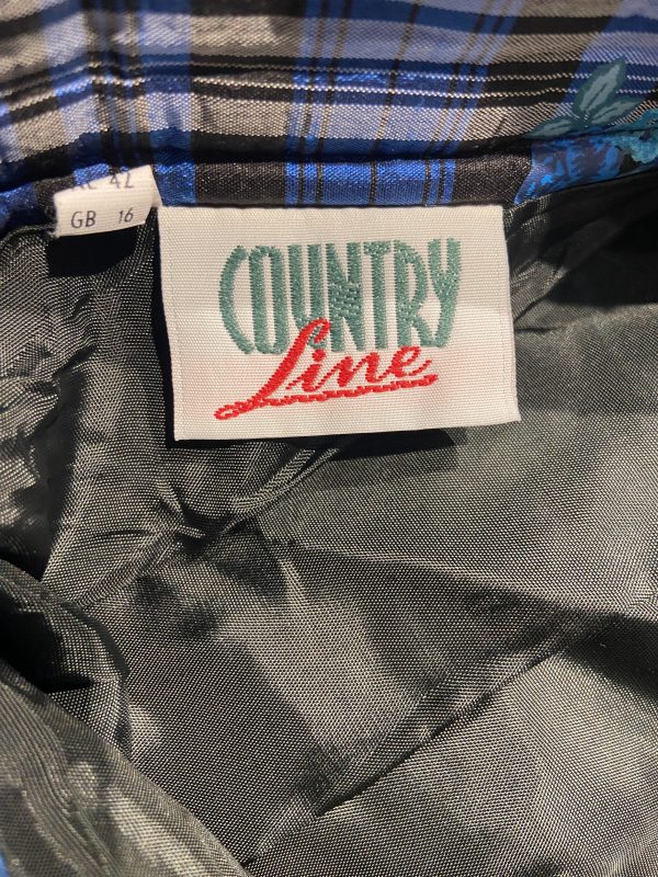 Country Line woven brand label inside early 1980s silk check skirt, made in Germany/Austria.