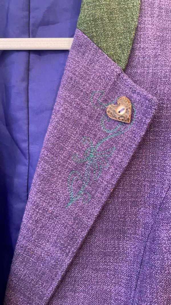 Close-up of embroidery on vintage Austrian jacket Heart-shaped buttons on 1970s Alpine Trachten jacket
