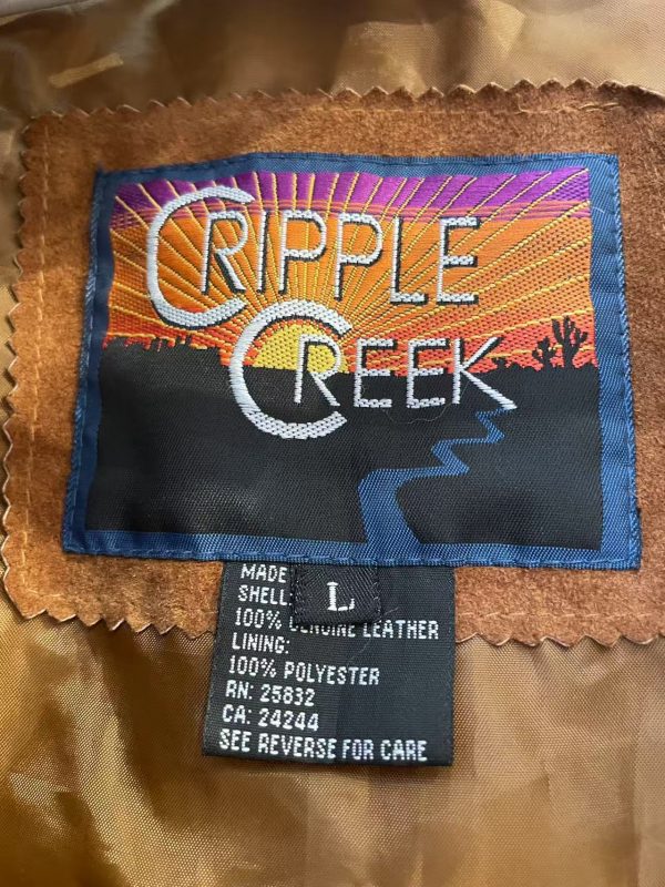 Cripple Creek embroidered label inside early 2000s suede fringe jacket