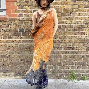 Model wearing late 1990s burnout velvet evening dress with cowl neck and ombré fade