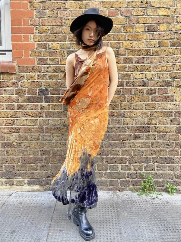 Model wearing late 1990s burnout velvet evening dress with cowl neck and ombré fade