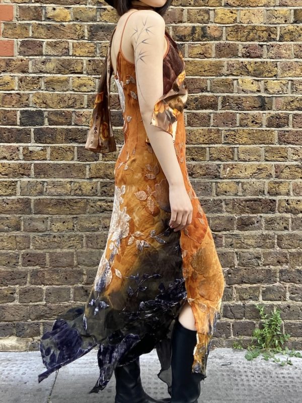 Side angle of 1990s floral burnout dress showing floor-length bias cut