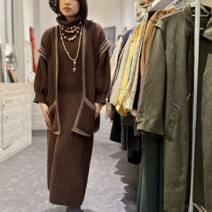 Model wearing late 1970s mohair knit set in shop