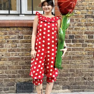 Home 4 - Gong Nong Bing Vintage 1950s Lord & Taylor Jumpsuit in red and cream polka dots worn with vintage cowboy boots