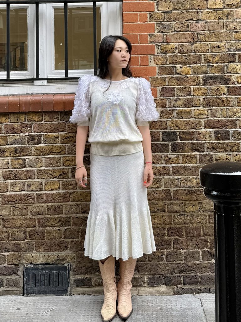 1980s French knit set with floral appliqué puff sleeves and matching cream skirt
